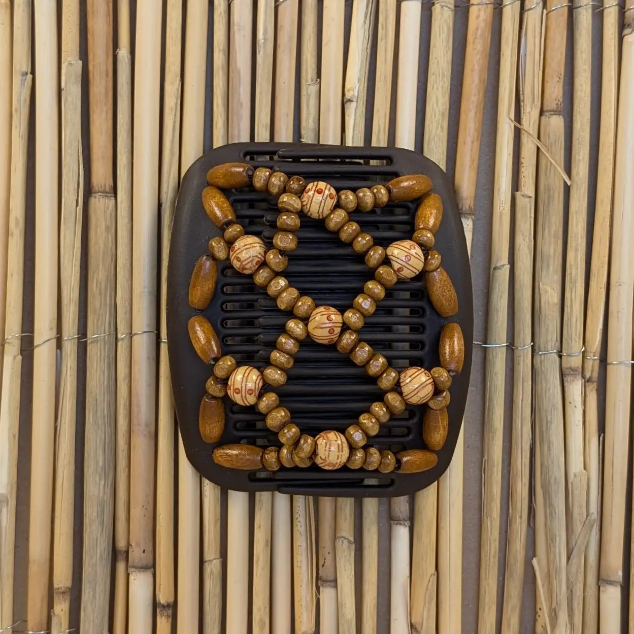 African Butterfly "Ndbele" mit braun-gemusterten Holzperlen braun