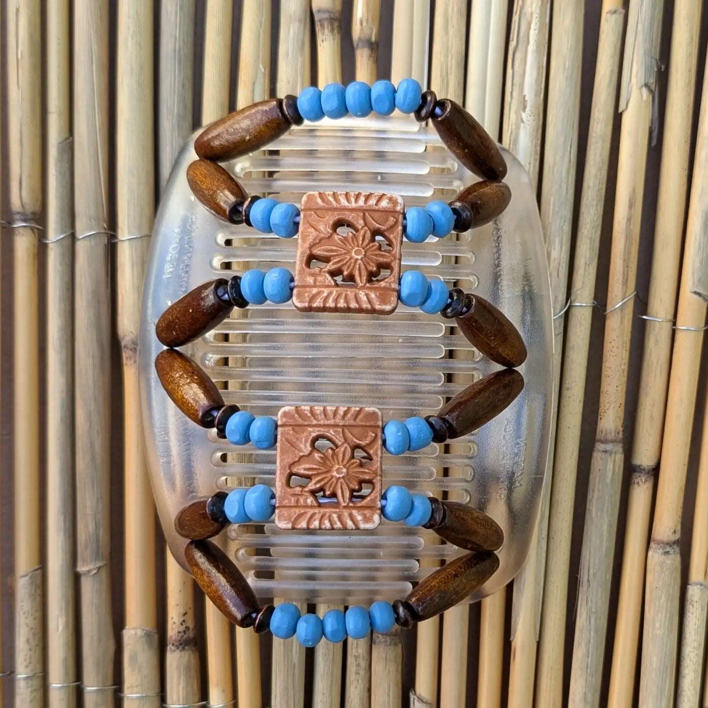 African Butterfly "Dupla" mit braun-hellblauen Holzperlen durchsichtig