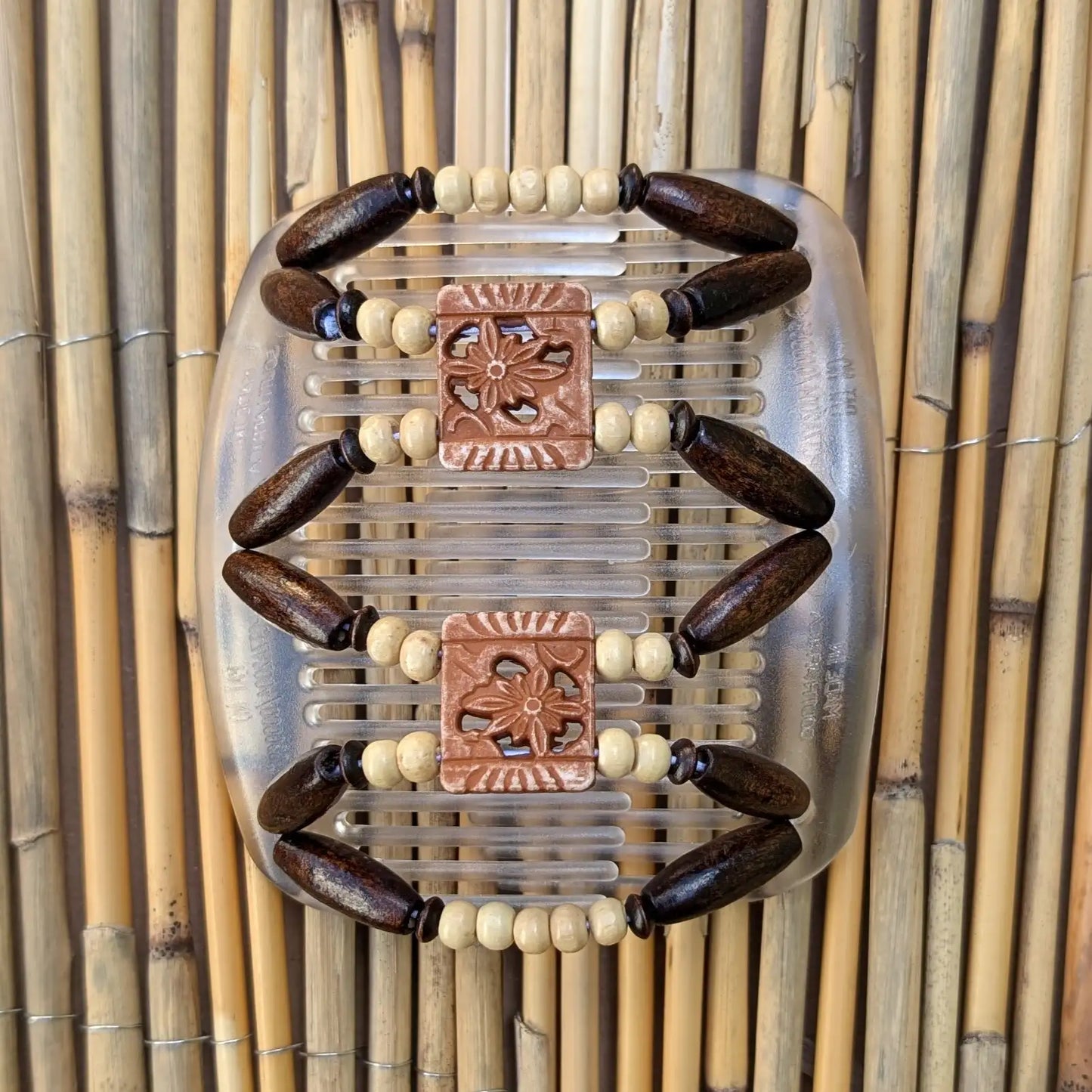 African Butterfly "Dupla" mit dunkelbraune-hellen Holzperlen durchsichtig