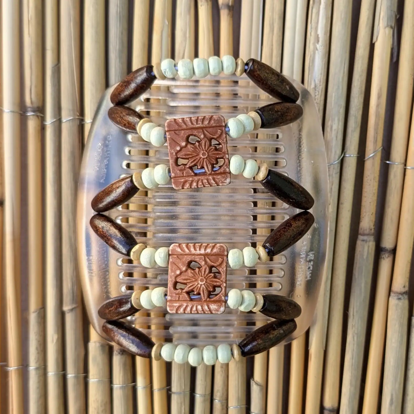 African Butterfly "Dupla" mit braun-weißen Holzperlen durchsichtig