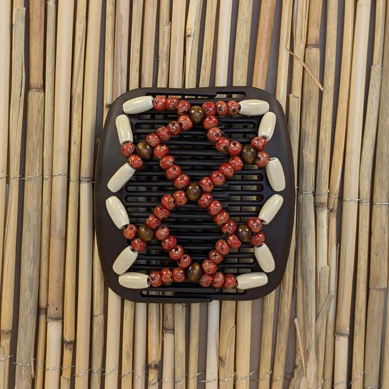 African Butterfly "Ndbele" mit creme-roten Holzperlen braun