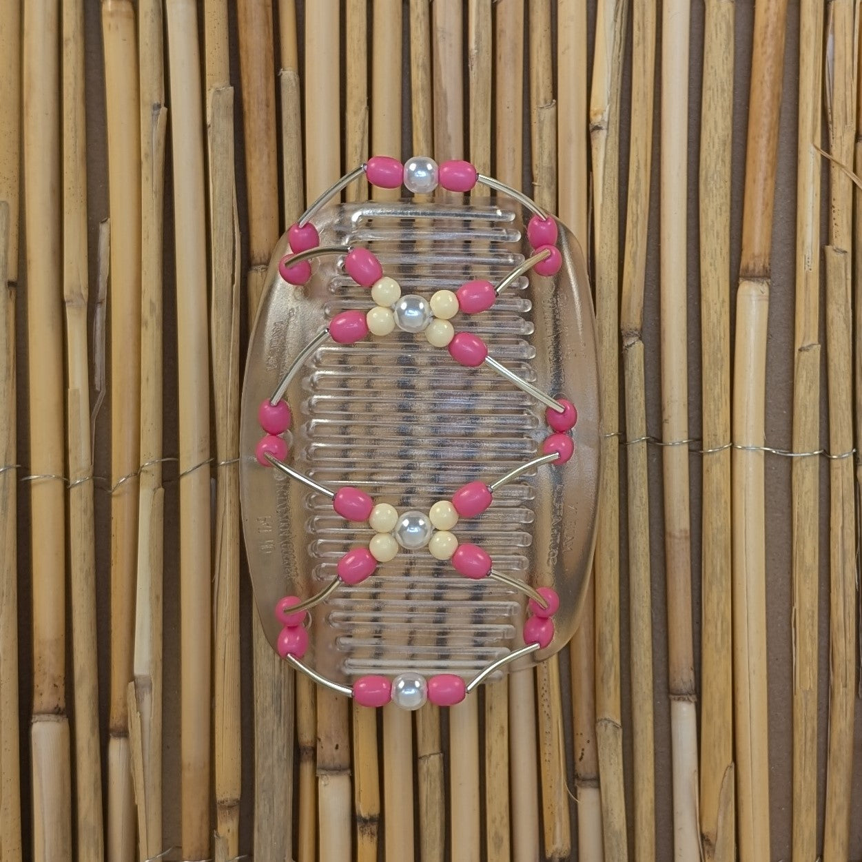 African Butterfly "Beada Tube" mit rosa-cremefarbenen Kunstperlen durchsichtig
