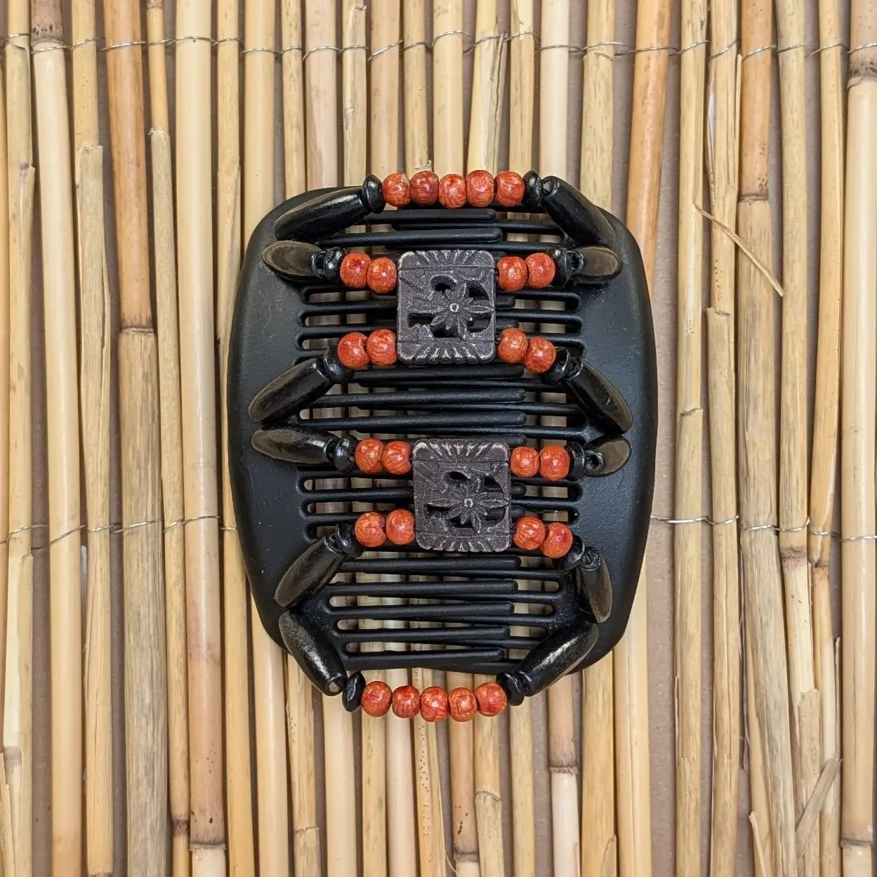 African Butterfly "Dupla" mit schwarz-orangenen Holzperlen schwarz