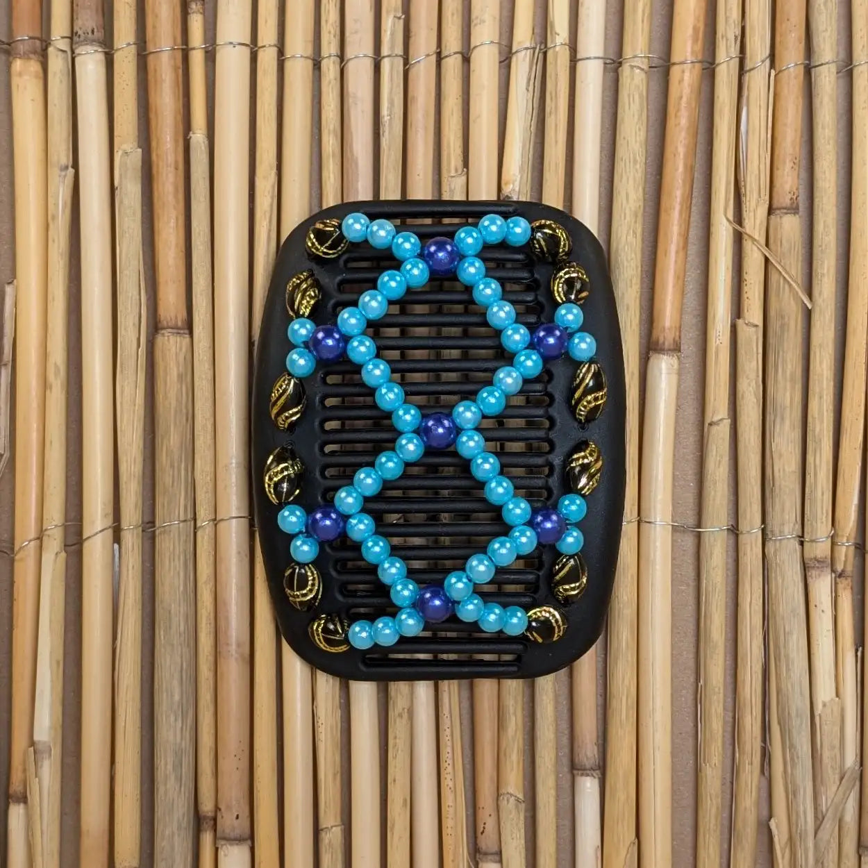 African Butterfly "Ndalena" mit schwarz-blauen Kunstperlen schwarz