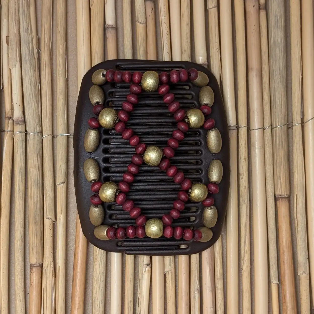 African Butterfly brauner Kamm mit gold roten Holzperlen