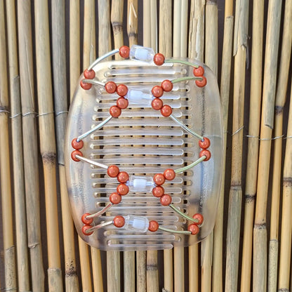 Durchsichtiger African Butterfly Haarkamm mit orangenen  und klaren Kunstperlen mit feinen Metallstäben - flexibler Haarschmuck für Hochsteckfrisuren.