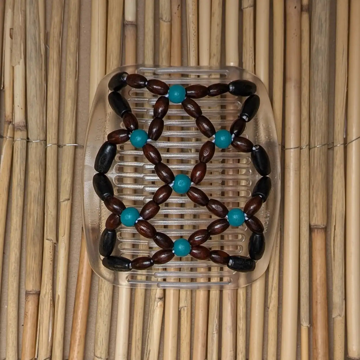 African Butterfly "Dalena" mit schwarz-türkisen Kunstperlen durchsichtig