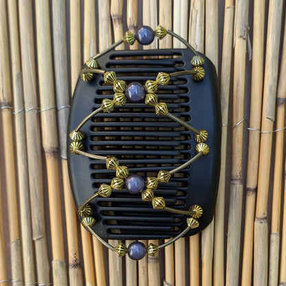 Schwarzer African Butterfly Haarkamm mit goldenen und rauchblauen Kunstperlen mit feinen Metallstäben - flexibler Haarschmuck für Hochsteckfrisuren.