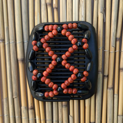 African Butterfly "Ndebele" mit schwarz-rotenen Holzperlen schwarz