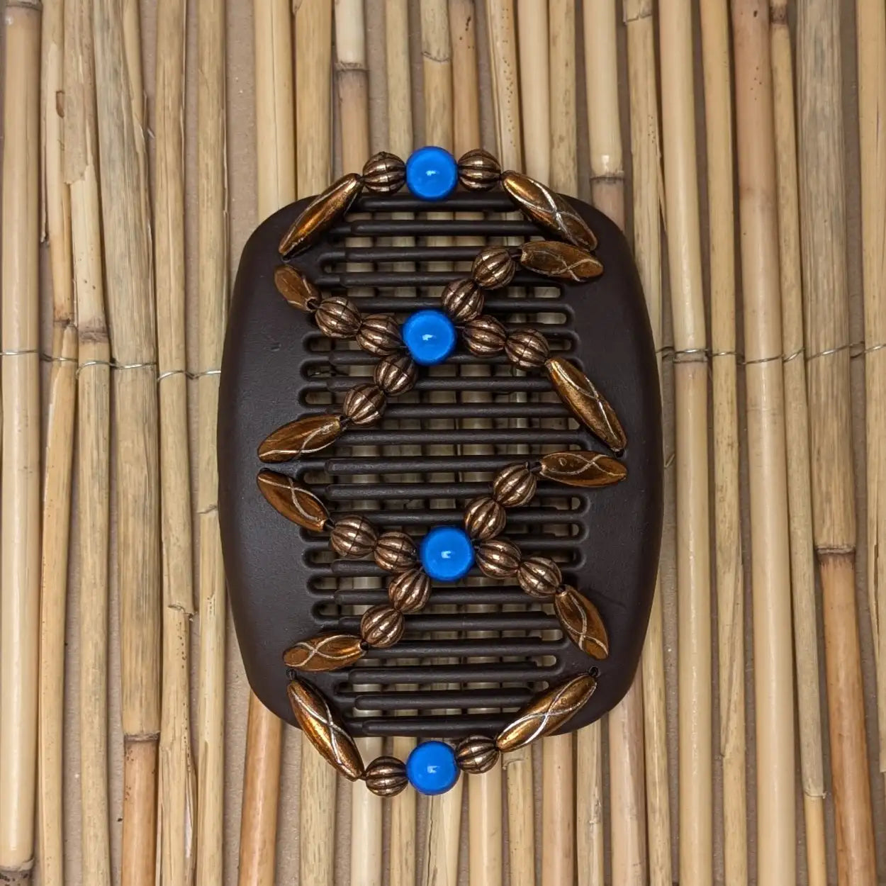 African Butterfly "Dalena" mit kupfer-blauen Kunstperlen braun