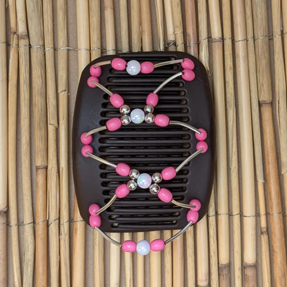 African Butterfly "Beada Tube" mit pink-weißen Kunstperlen braun