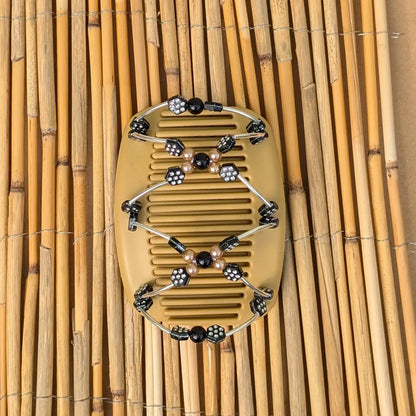 Beiger African Butterfly Haarkamm mit schwarzen und pfirsichfarbene Kunstperlen mit feinen Metallstäben - flexibler Haarschmuck für Hochsteckfrisuren.