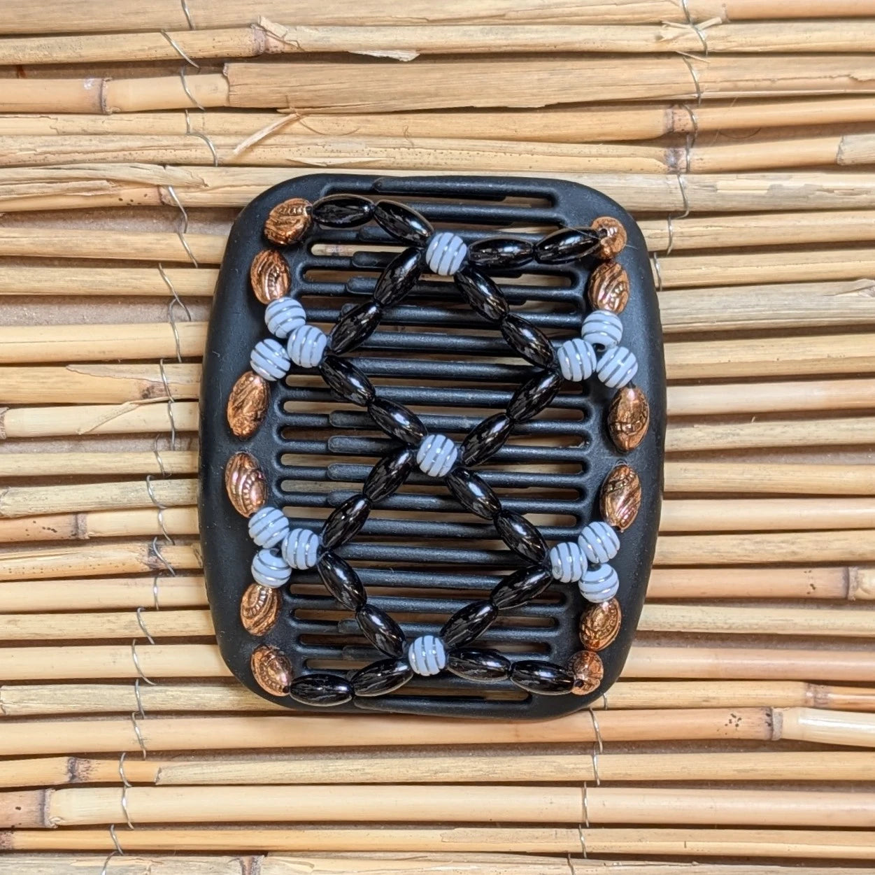 African Butterfly "Ndalena" mit bronze-schwarzen Kunstperlen schwarz