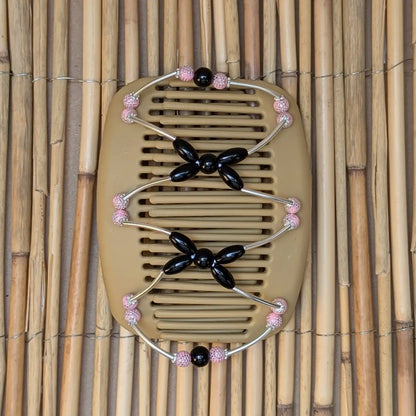 African Butterfly "Beada Tube" mit rosa-schwarzwn Kunstperlen beige