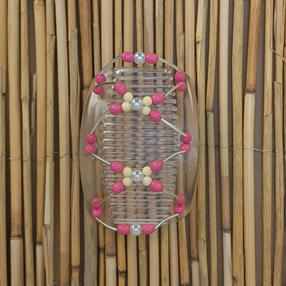 Durchsichtiger African Butterfly Haarkamm mit rosanen und creme Kunstperlen mit feinen Metallstäben - flexibler Haarschmuck für Hochsteckfrisuren.