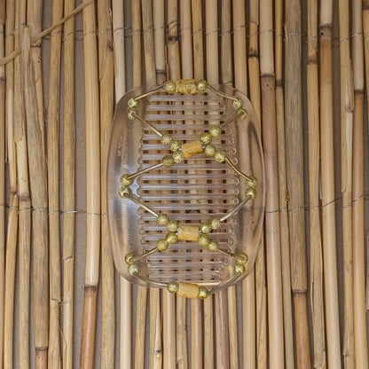 Durchsichtiger African Butterfly Haarkamm mit goldenen und gelben Kunstperlen mit feinen Metallstäben - flexibler Haarschmuck für Hochsteckfrisuren.