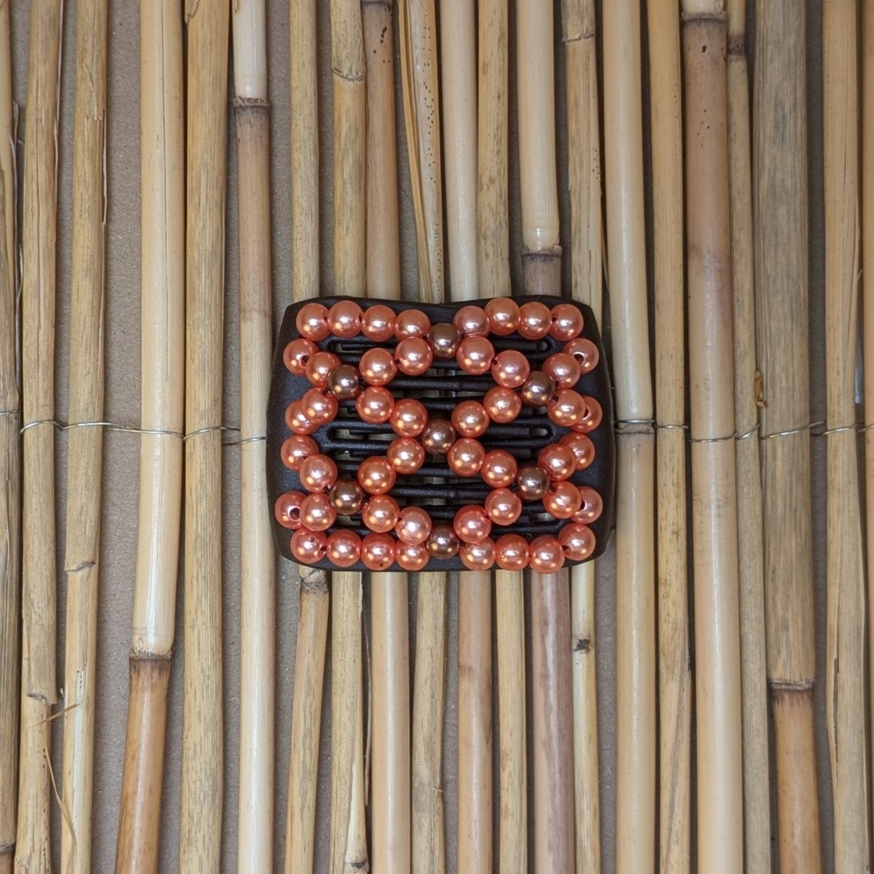 Ladybug "Ndalena" mit orange-braunen Kunstperlen schwarz
