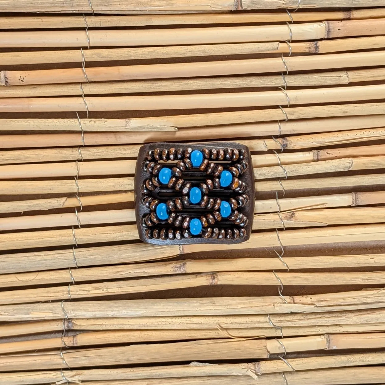 Ladybug (mini) "Ndbele" mit braun-blauen Holzperlen braun