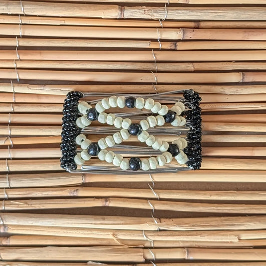 Rhino "Ndbele" klein mit schwarz-weißen Holzperlen