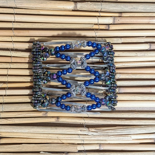 Rhino "Ndalena" mittel mit blauen Kunstperlen