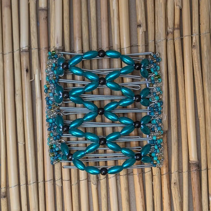 Rhino "Ndalena" groß mit türkis-schwarzen Kunstperlen