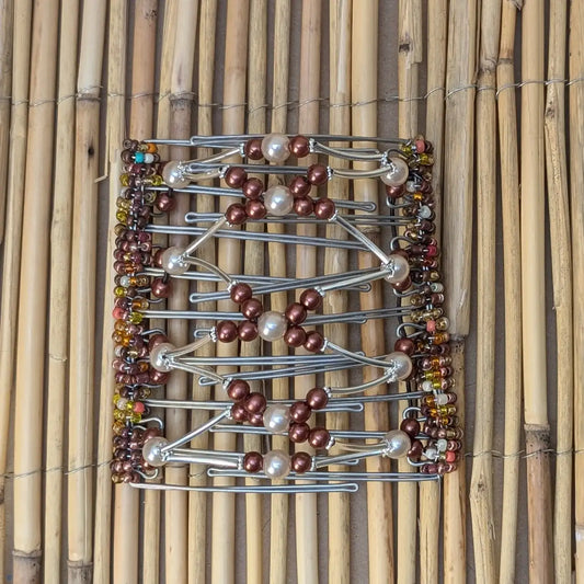 Rhino "Ndalena" groß mit braun-aprikosen Kunstperlen