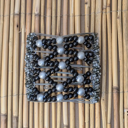 Rhino "Ndebele" groß mit schwarz-grauen Holzperlen