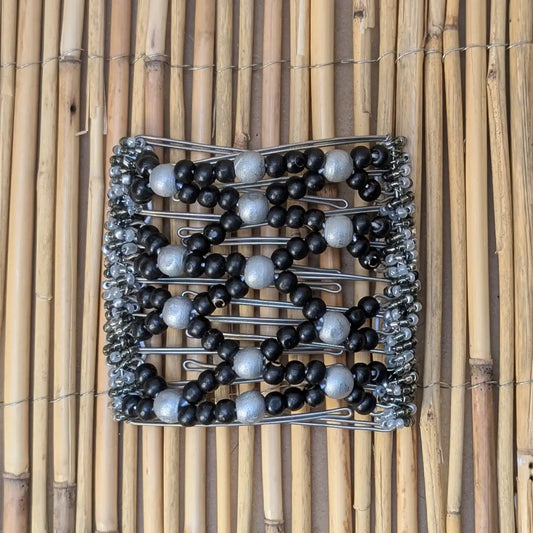 Rhino "Ndebele" groß mit schwarz-grauen Holzperlen