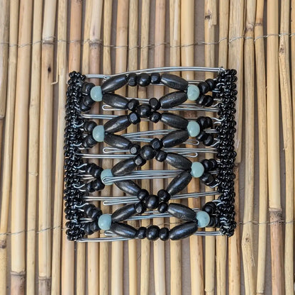 Rhino "Ndbele" groß mit schwarz-mint Holzperlen