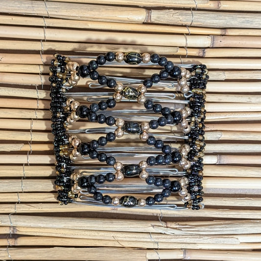 Rhino "Ndalena" groß mit gold-schwarzen Kunstperlen