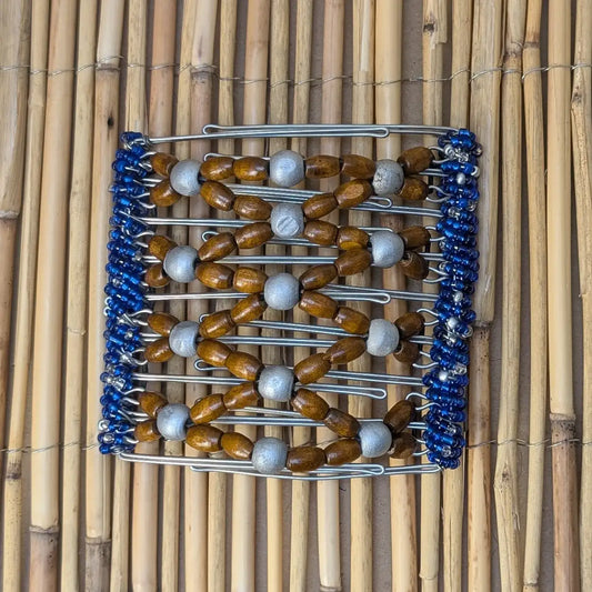 Rhino "Ndbele" groß mit braun-silbernen Holzperlen