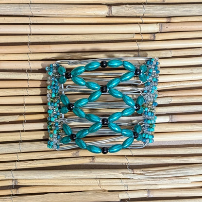 Rhino "Ndalena" mittel mit grün-schwarzen Kunstperlen