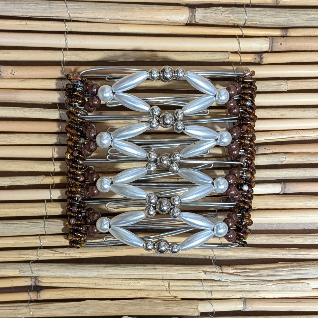 Rhino "Ndalena" groß mit braun-cremefarbenen Kunstperlen