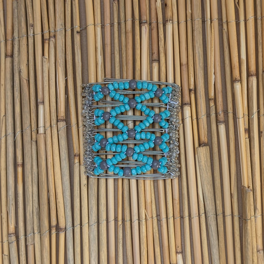 Rhino "Ndbele" groß mit türkis-grauen Holzperlen
