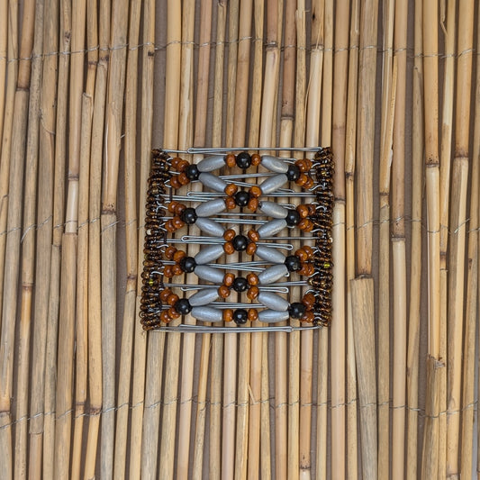 Rhino "Ndbele" groß mit braun-silbernen Holzperlen