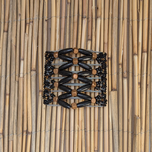 Rhino "Ndbele" groß mit schwarzen-goldenen Holzperlen