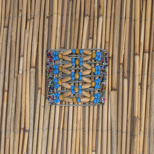Rhino "Ndbele" groß mit blauen-hellbraunen Holzperlen