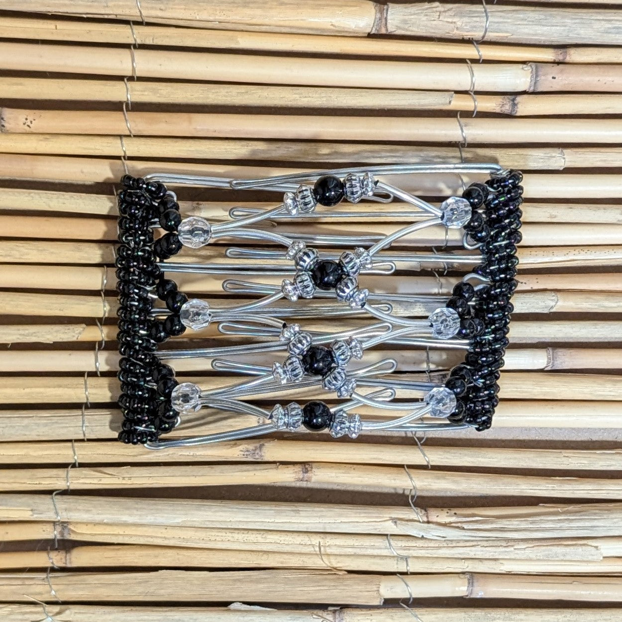 Rhino "Beada Tube" mittel mit silber-schwarzen Kunstperlen