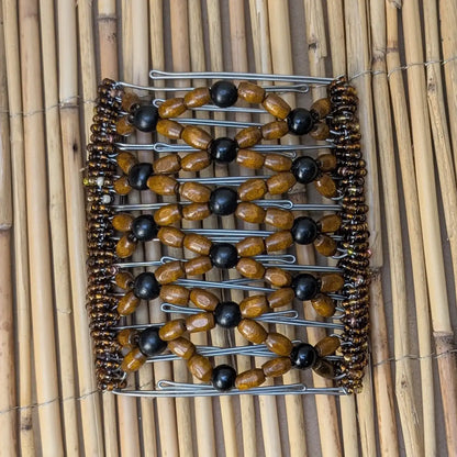 Rhino "Ndbele" extragroß mit braun-schwarzen Holzperlen