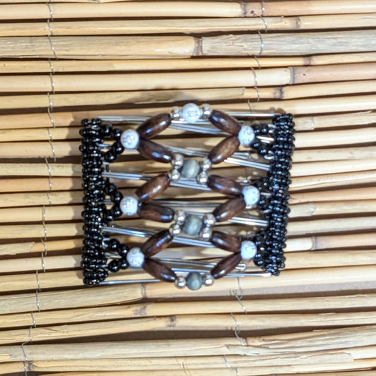 Rhino "Ndbele" mittel mit schwarz-braunen Holzperlen