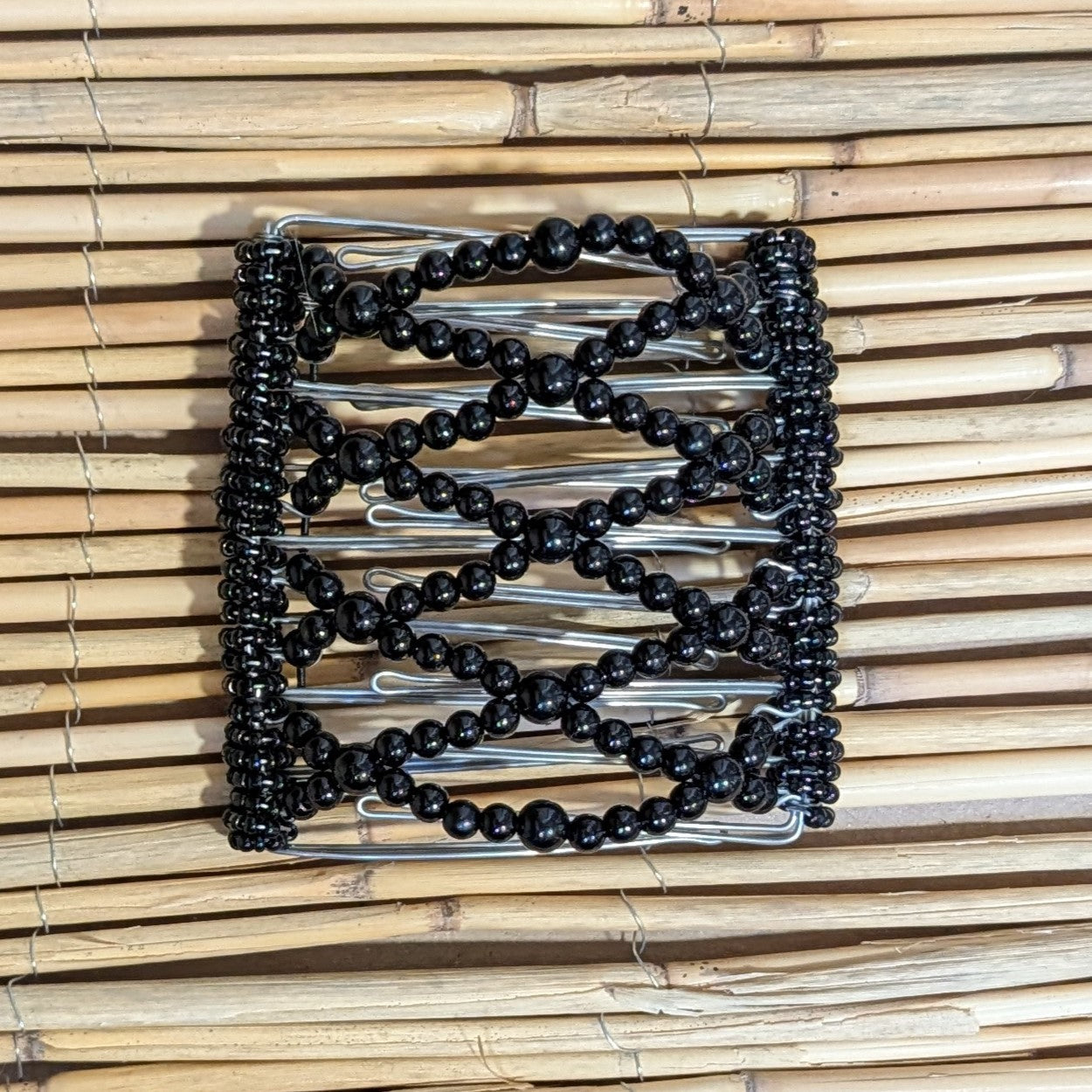 Rhino "Ndalena" groß mit schwarzen Kunstperlen