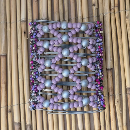 Rhino "Ndbele" extragroß mit lila-silbernen Holzperlen