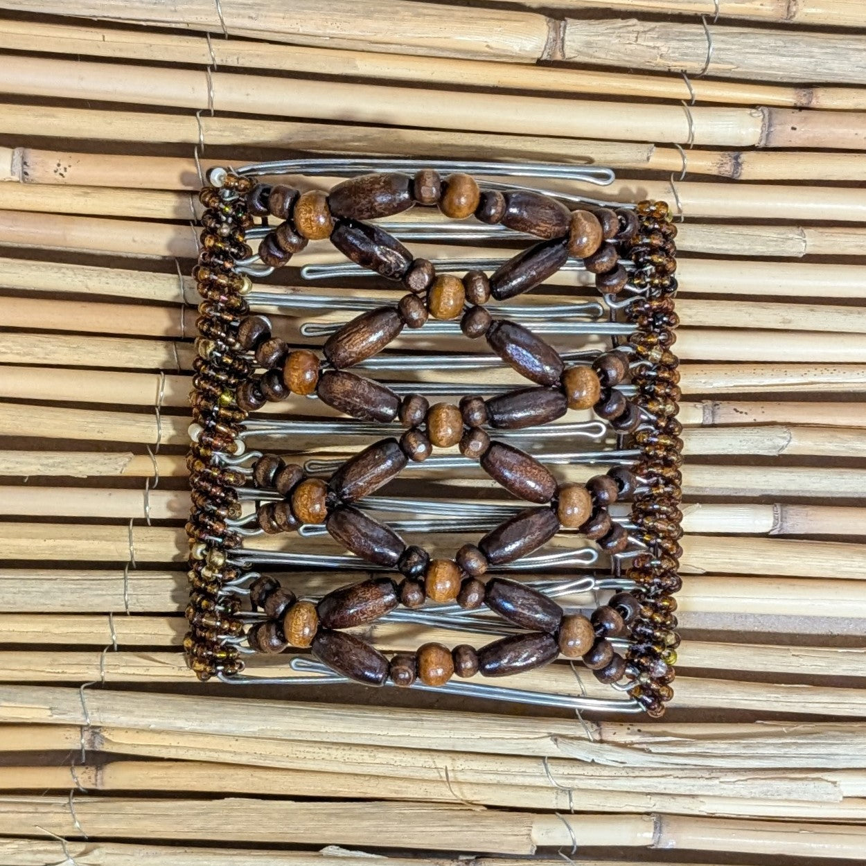 Rhino "Ndbele" groß mit braunen Holzperlen